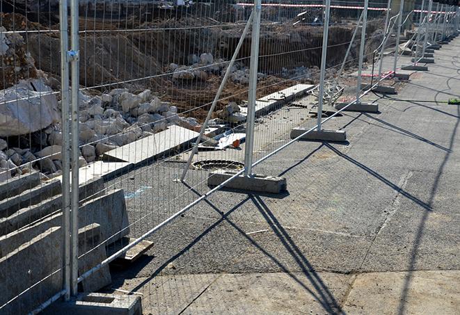 temporary fence panels in place ensuring unauthorized personnel stays out